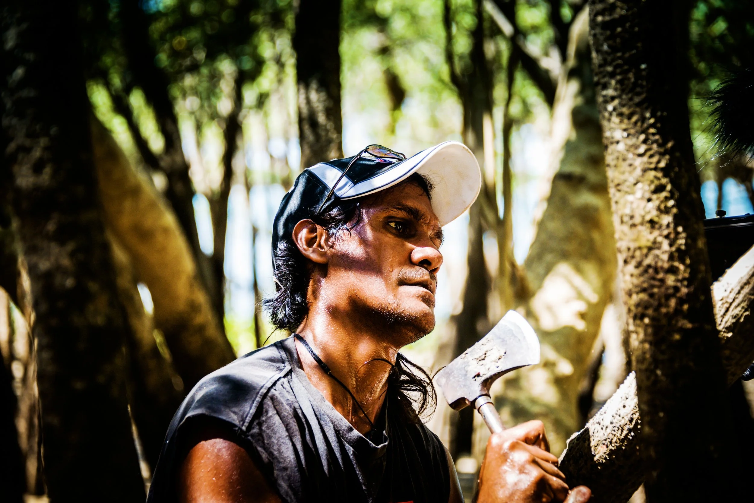 Albert Wiggins harvesting mangrove logs for a traditional raft in the Kimberley