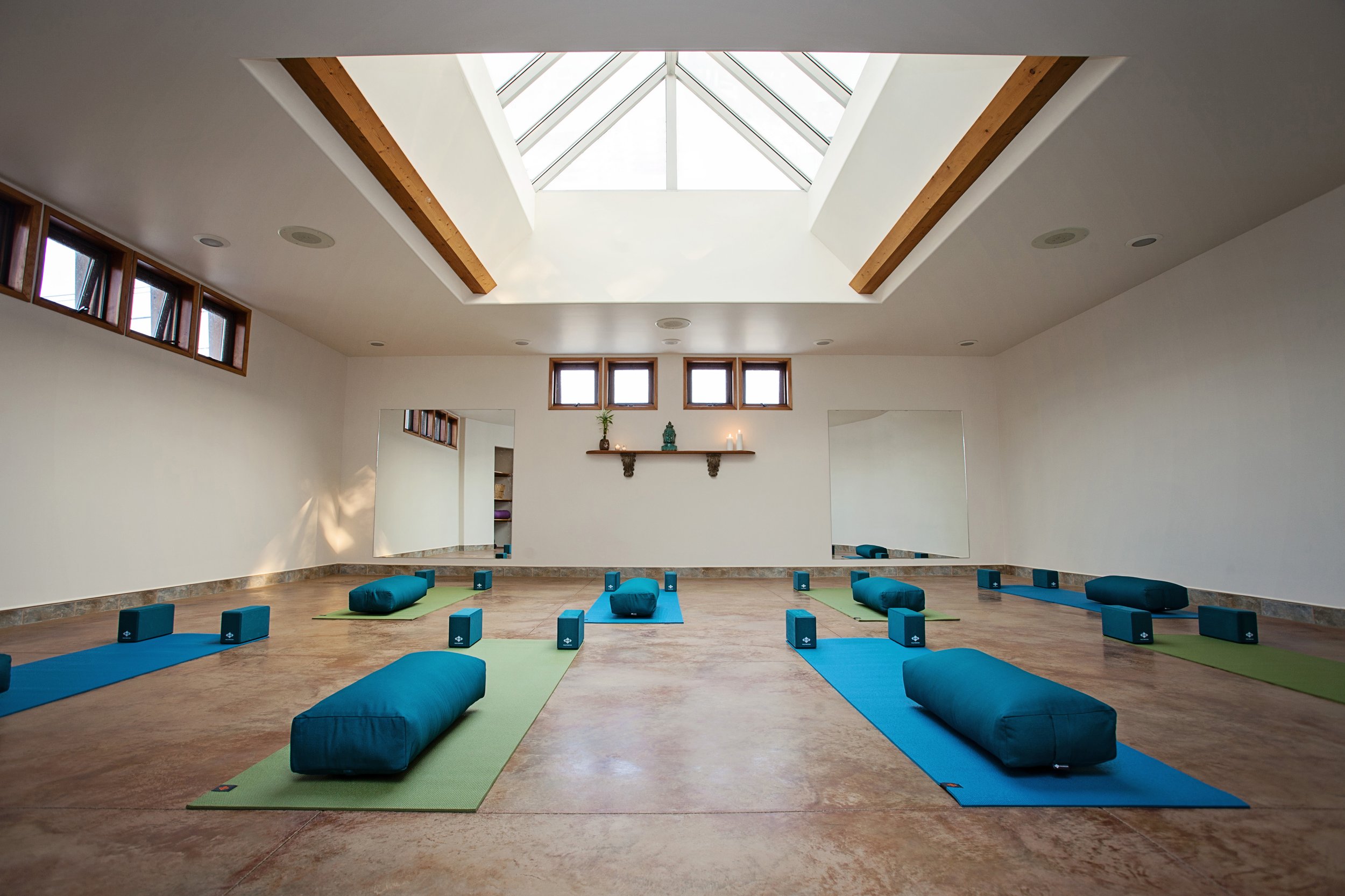 Group Meditating In Yoga Studio by Stocksy Contributor Milles Studio -  Stocksy