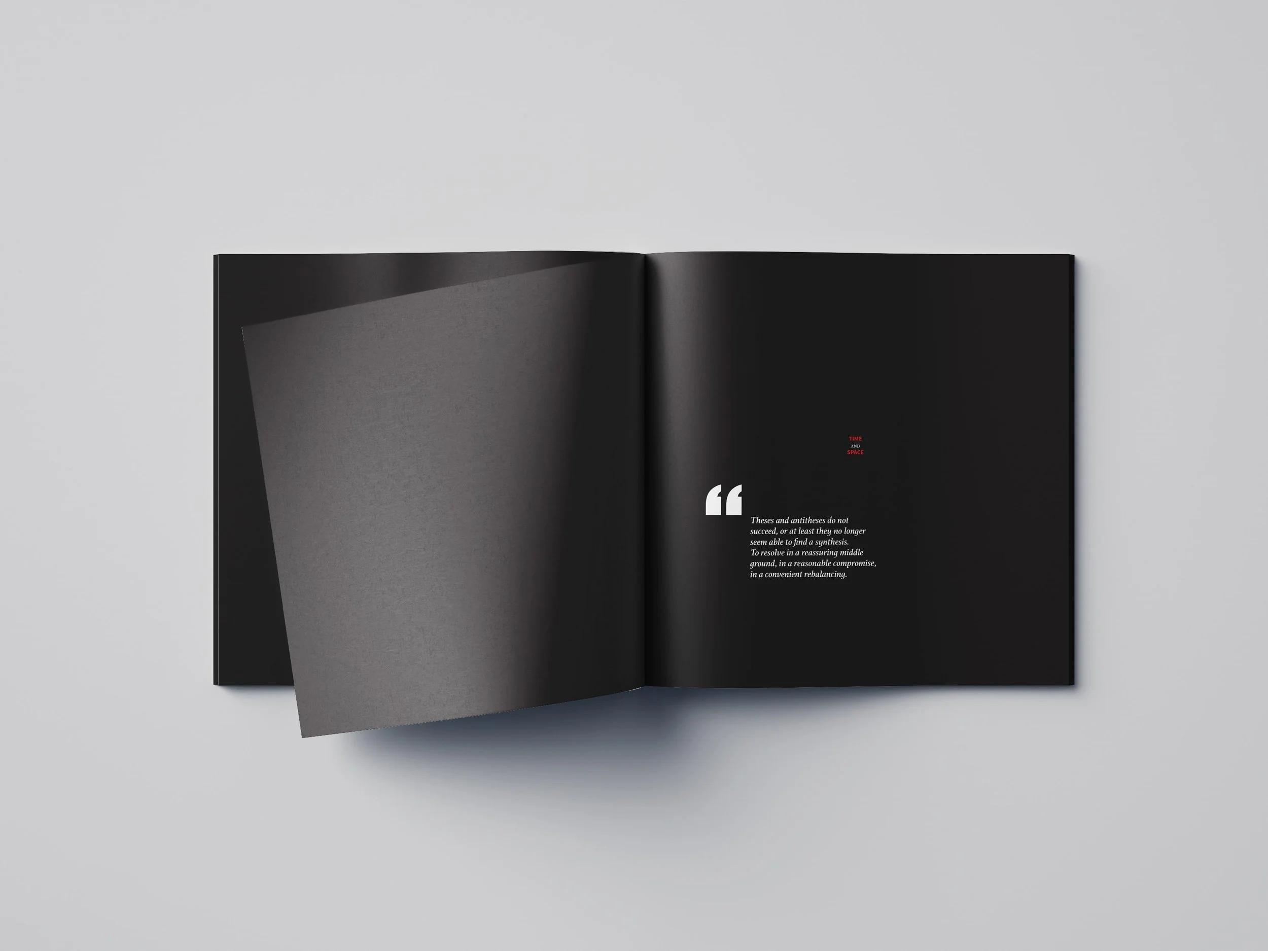 Professional editorial and print design with black pages and bold red typographic details.