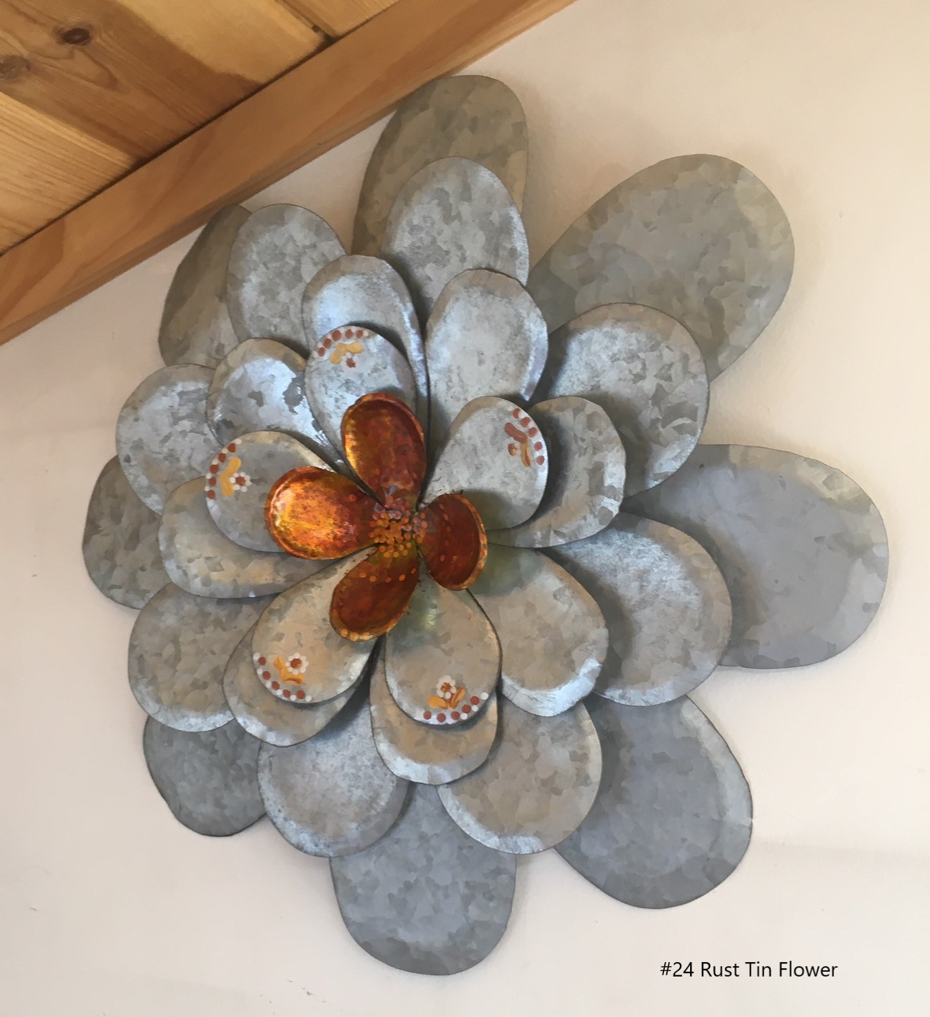 SOLD #24 Rust Tin Flower.png