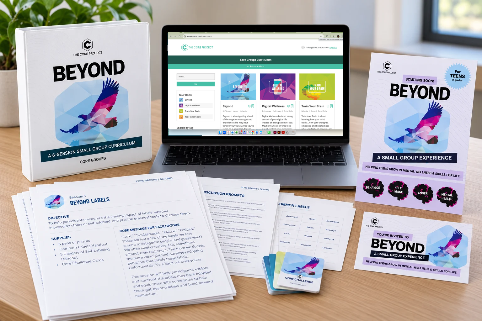 Core Groups Beyond curriculum displayed on a laptop alongside printable session plans, Core Challenge Cards, and group recruitment materials.
