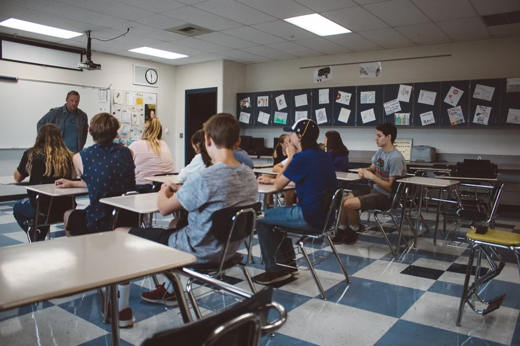 curriculum-guide.jpg Middle and high school students participating in a classroom lesson and discussion.