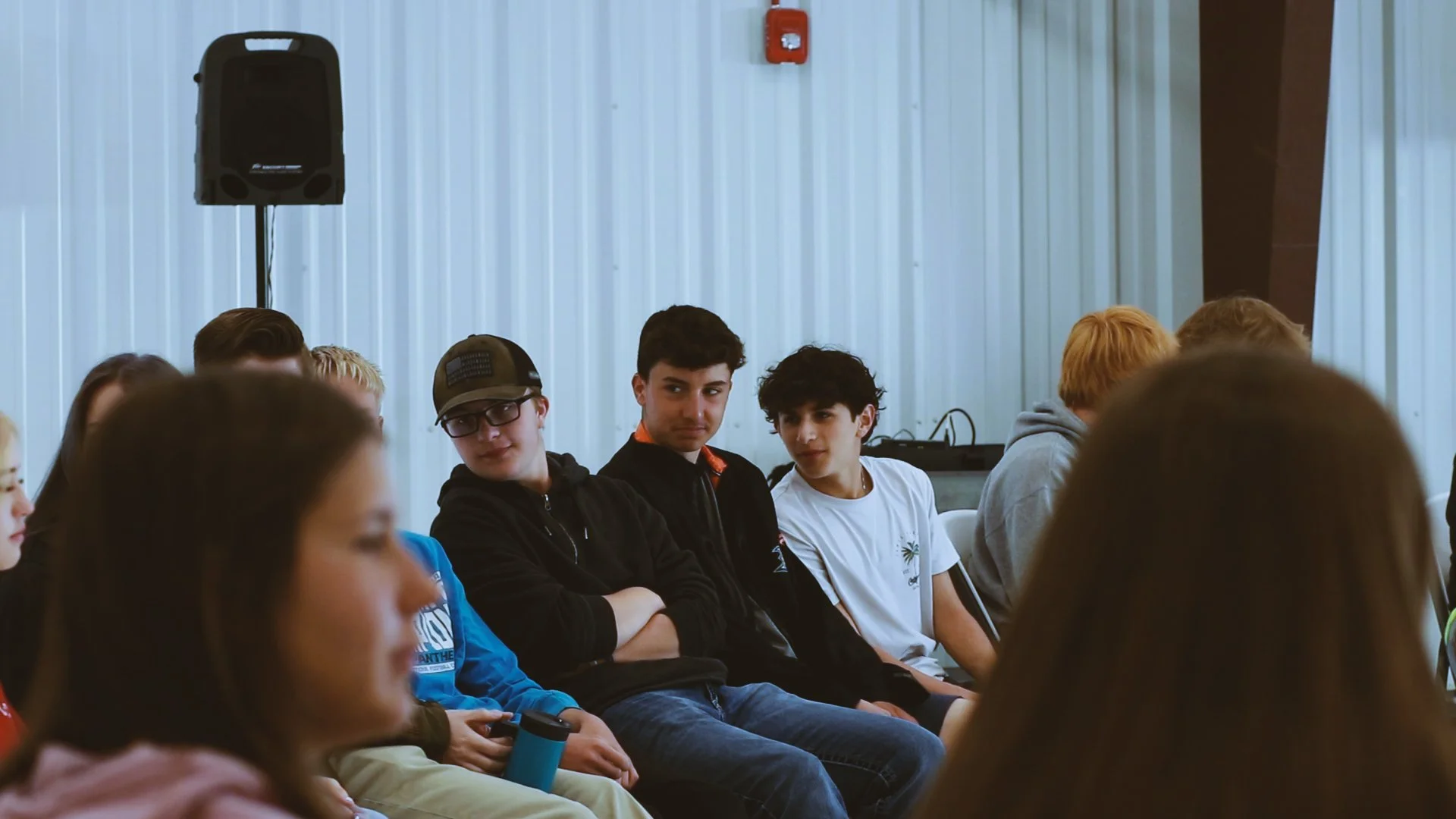 Students participating at different levels during a classroom group activity.