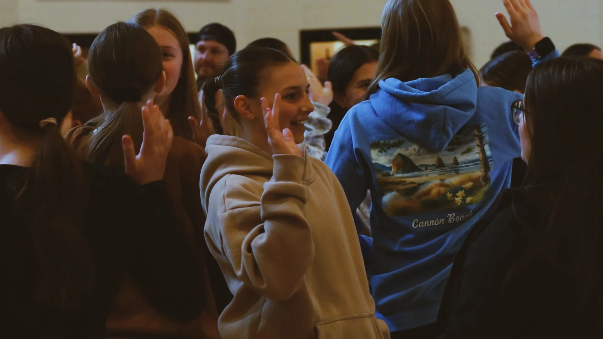Students laughing and talking together during a Core Day activity.
