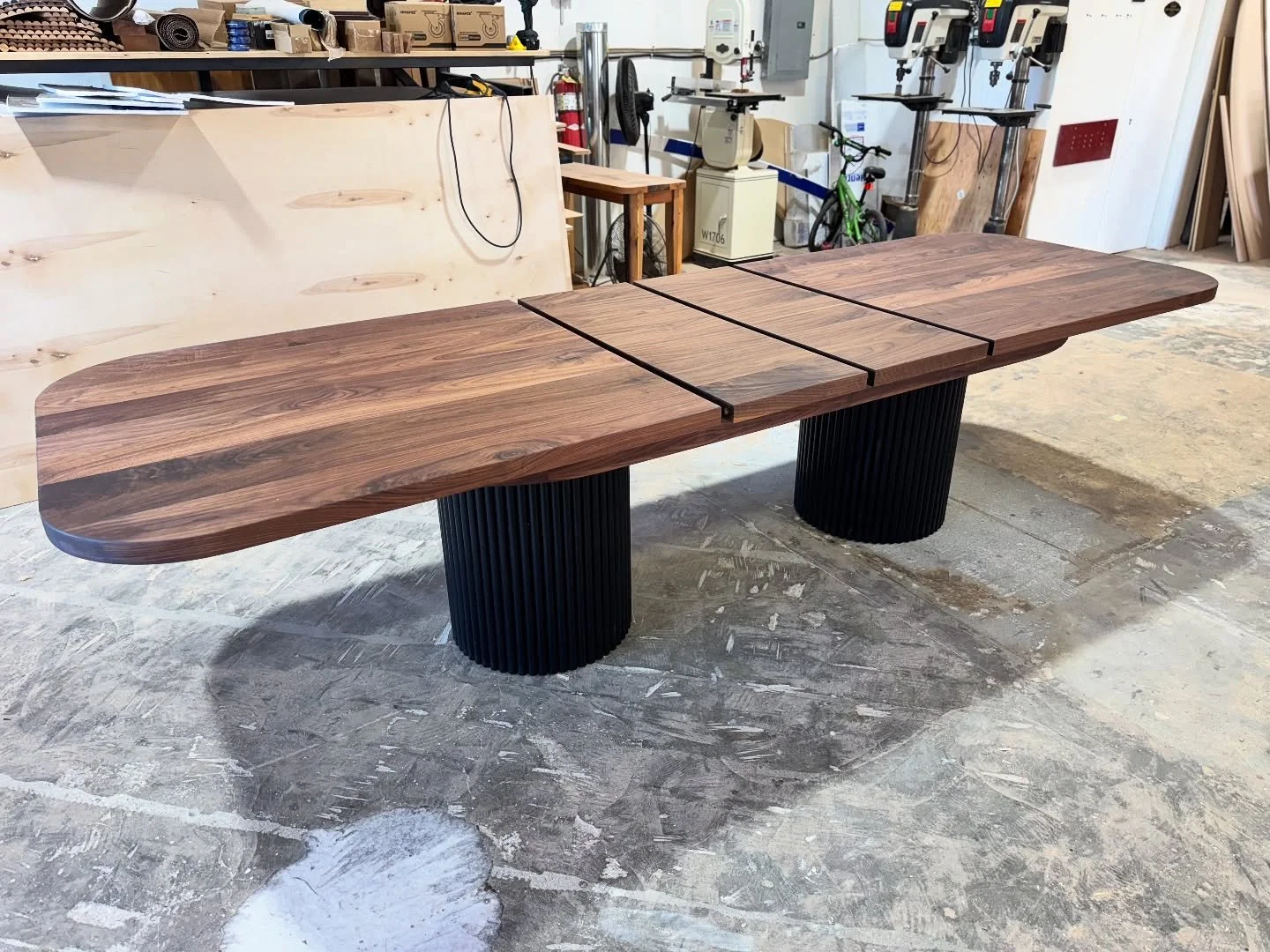 New style!
This is a version of our &lsquo;Sicily dining table in solid Walnut. With extension.
Closed dimensions 96x42&rdquo; with two 15&rdquo; extensions.
Featuring black fluted bases.
Always enjoy the challenge of redesigning our styles to suit n