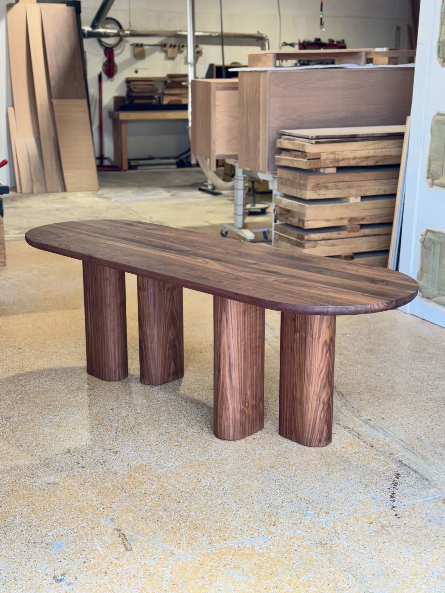 Another new style we had to opportunity to create. Our signature racetrack oval paired with 4 matching offset pedestals.
Pictured in Walnut.
This was a long and thin piece for a tight dining space.
96x36&rdquo;x30&rdquo; dimensions.
&mdash;&mdash;&md