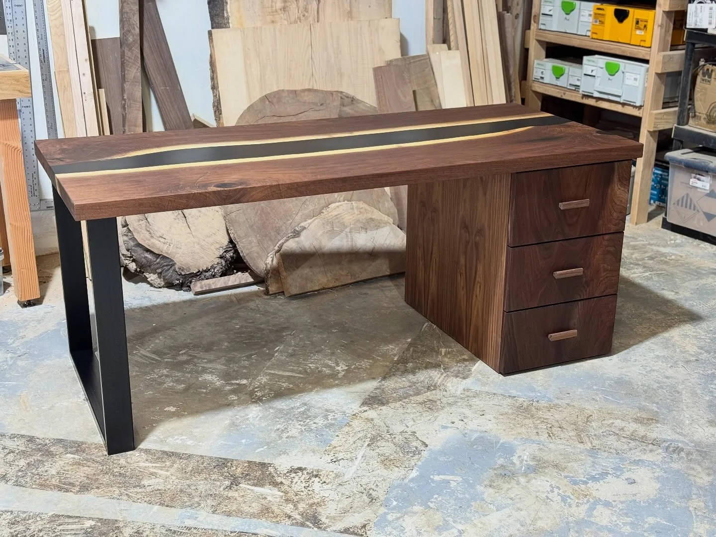 Custom desk and matching game table.
Live edge Walnut slabs paired with black resin. The desk features an offset drawer box. We used the slab offcuts to match for the drawers.
72x30x30&rdquo;
Matching Gaming table 42x42&rdquo;x30&rdquo;
&mdash;&mdash
