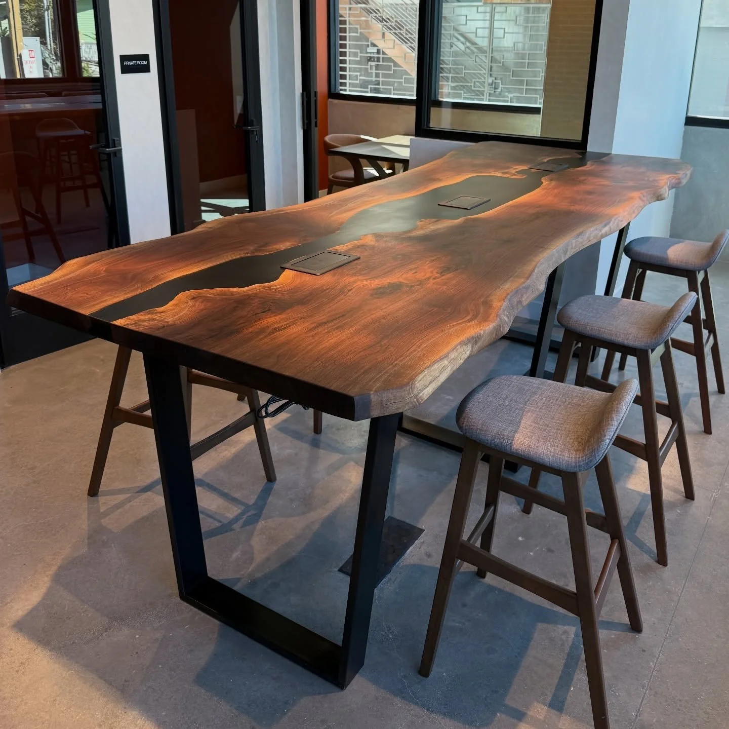 Live edge community table. For a new development here in SD.
Featuring live edge Walnut slabs paired with black resin. Also featuring 3 wireless charging ports/pop up outlets.
Another fun project.
Dimensions were 120x48x42&rdquo;
Finished with @rubio