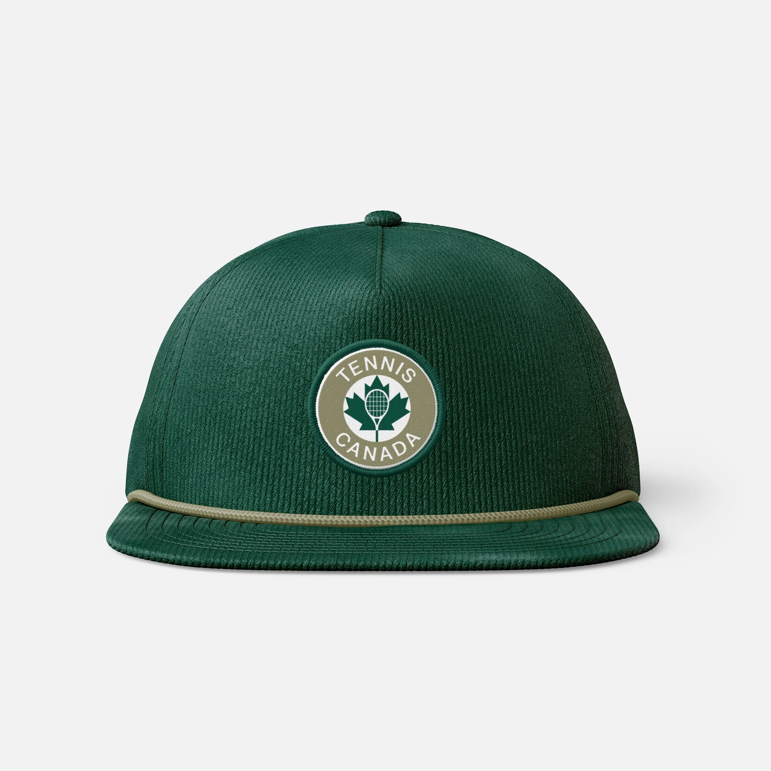 Green baseball cap with a circular patch on the front featuring the words 'Tennis Canada' and a tennis ball logo.