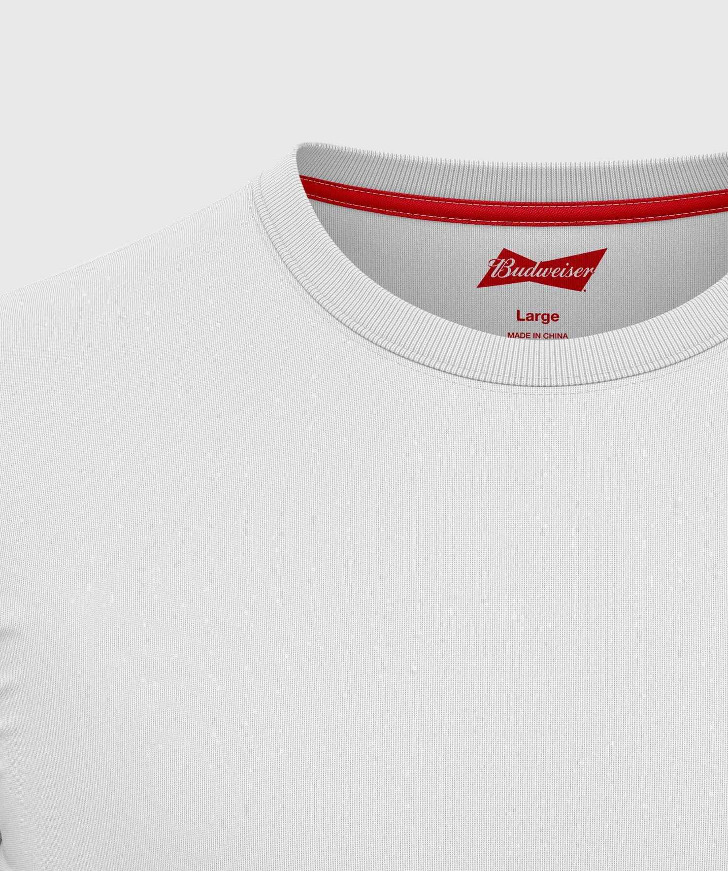 Close-up of a white T-shirt with a red brand tag and label inside the collar, indicating size Large and made in China.