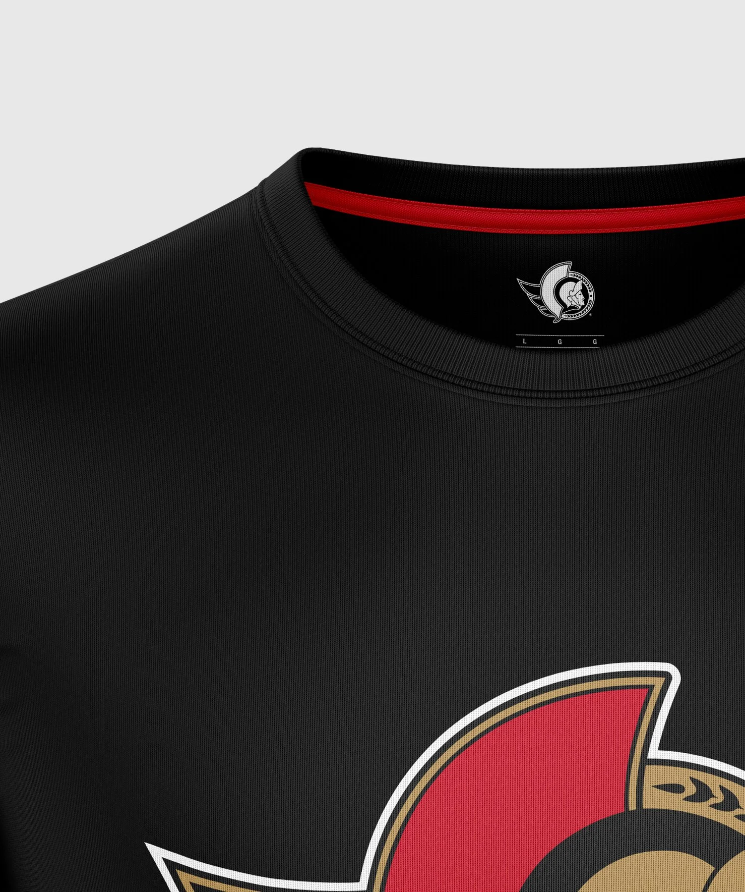Close-up of a black athletic jersey with a red and gold Ottawa Senators logo.