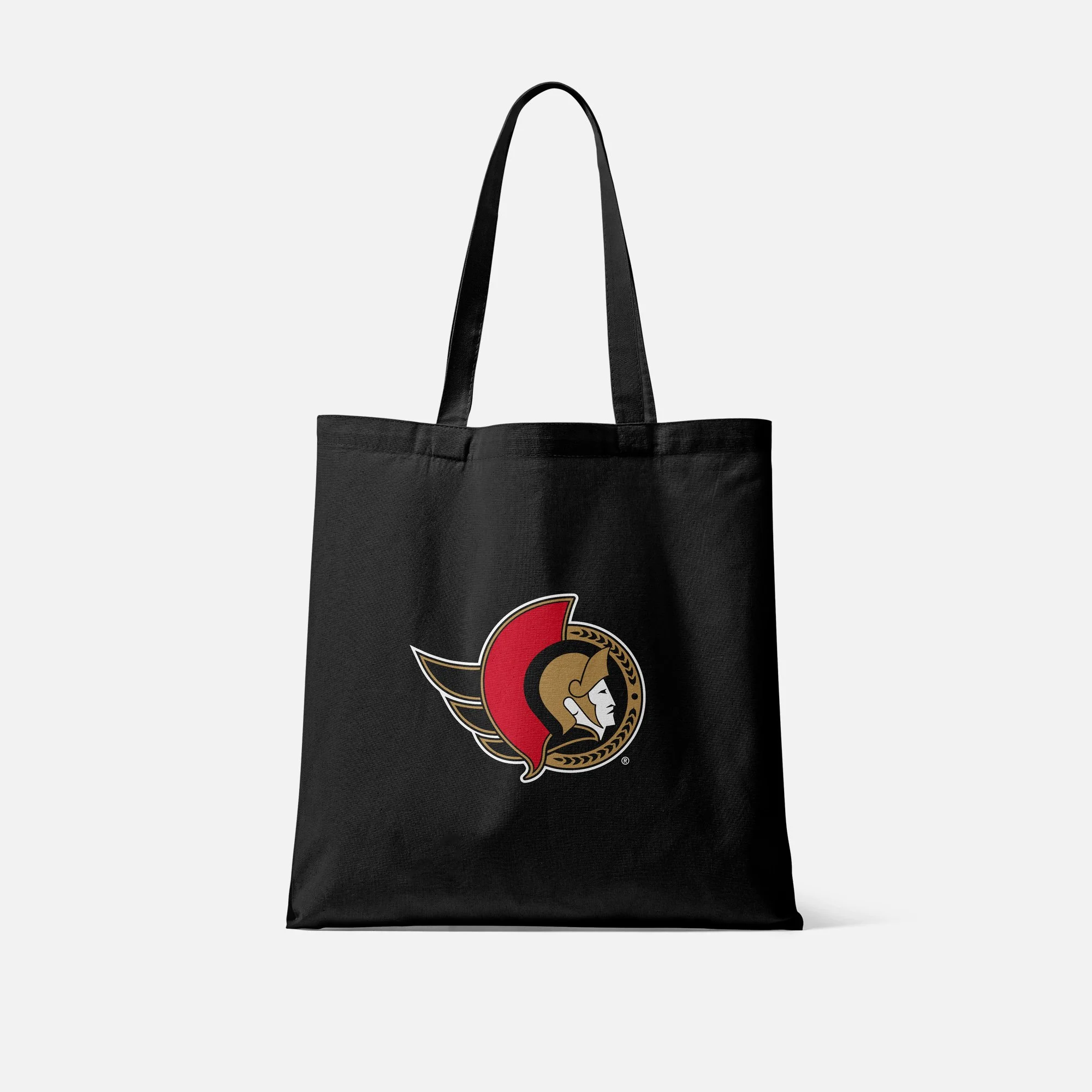 Black tote bag with a circular logo featuring a Roman or Greek helmeted figure.