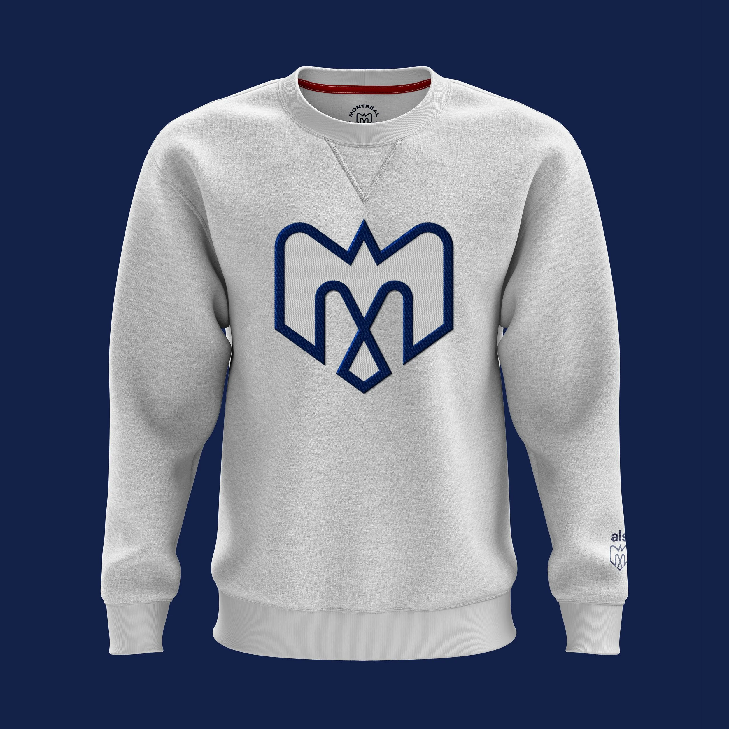 Gray sweatshirt with a blue and white box logo on the front, featuring a stylized crown design, against a dark blue background.