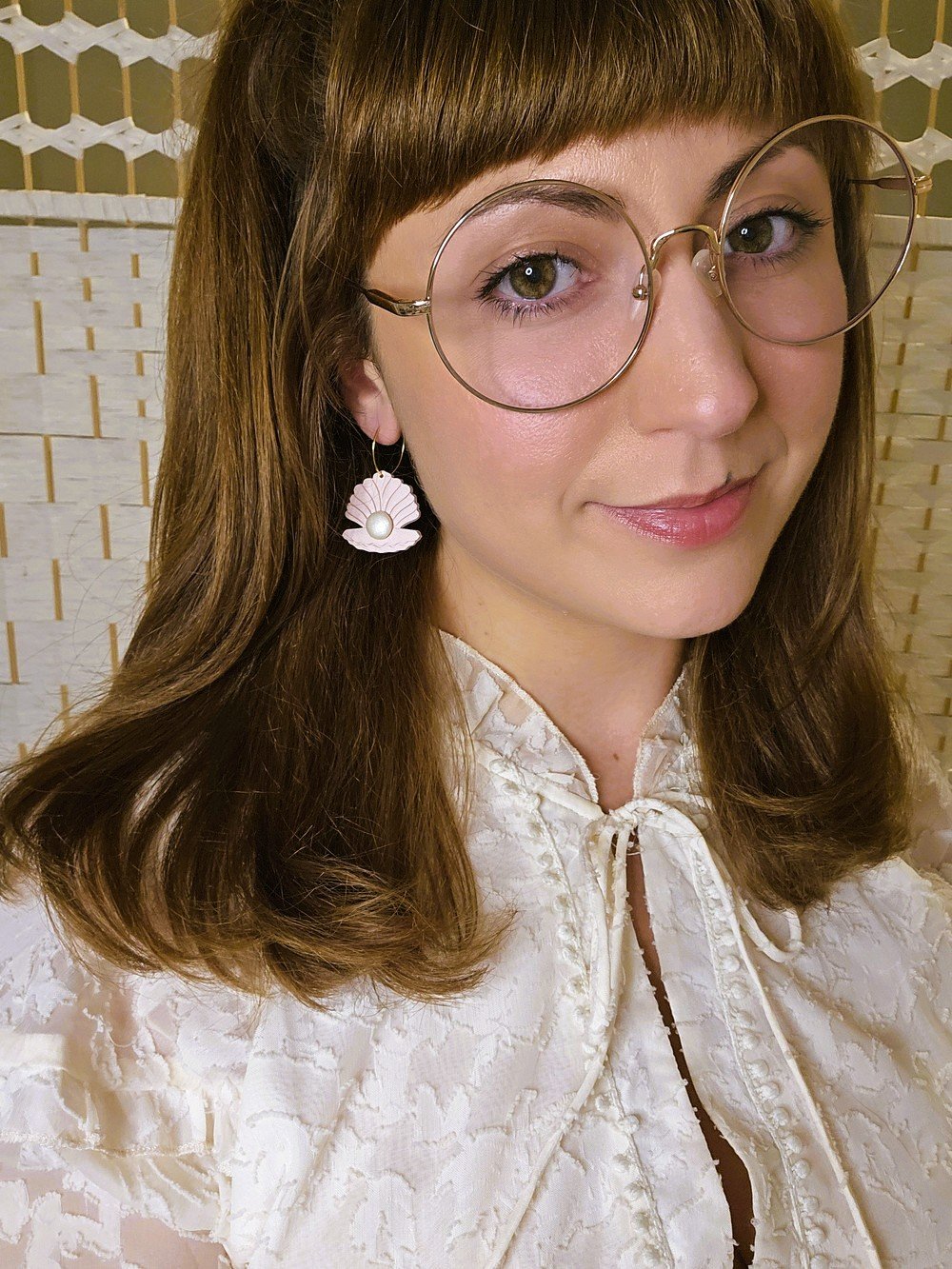 polymer-clay-earrings-shell-dangle-blush-pink-pearl-on-model.jpg