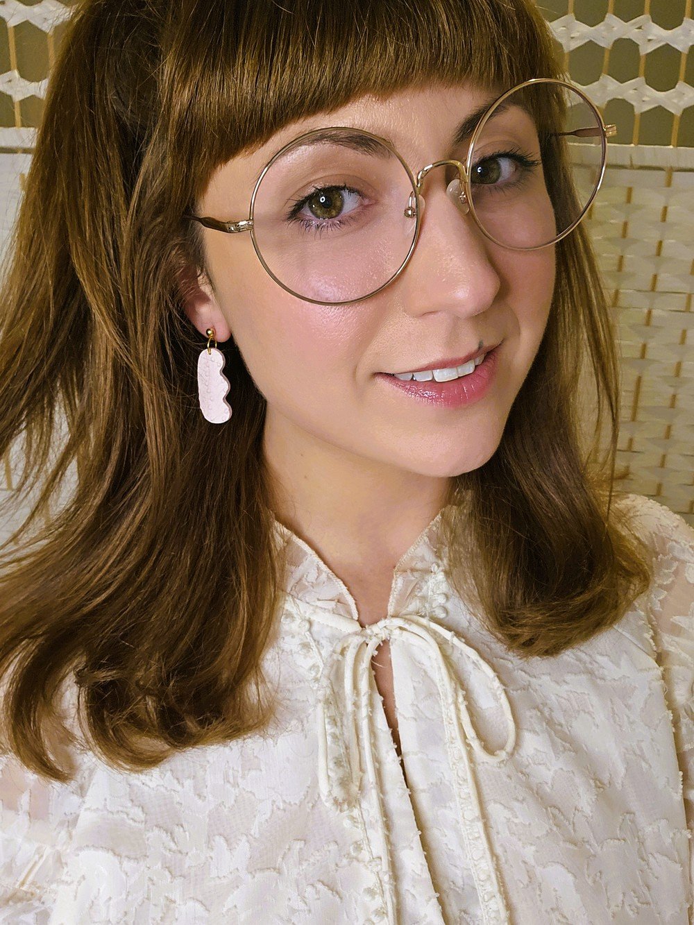 polymer-clay-earrings-wavy-dangle-blush-pink-on-model.jpg