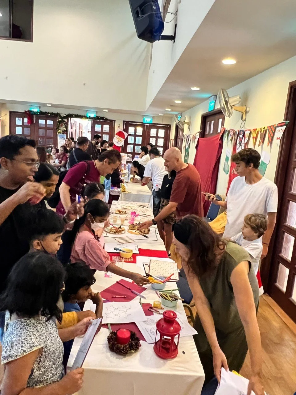 Tables by Portuguese Association Singapore, with a colouring station and special Christmas goodies at the Children's Christmas Treat.