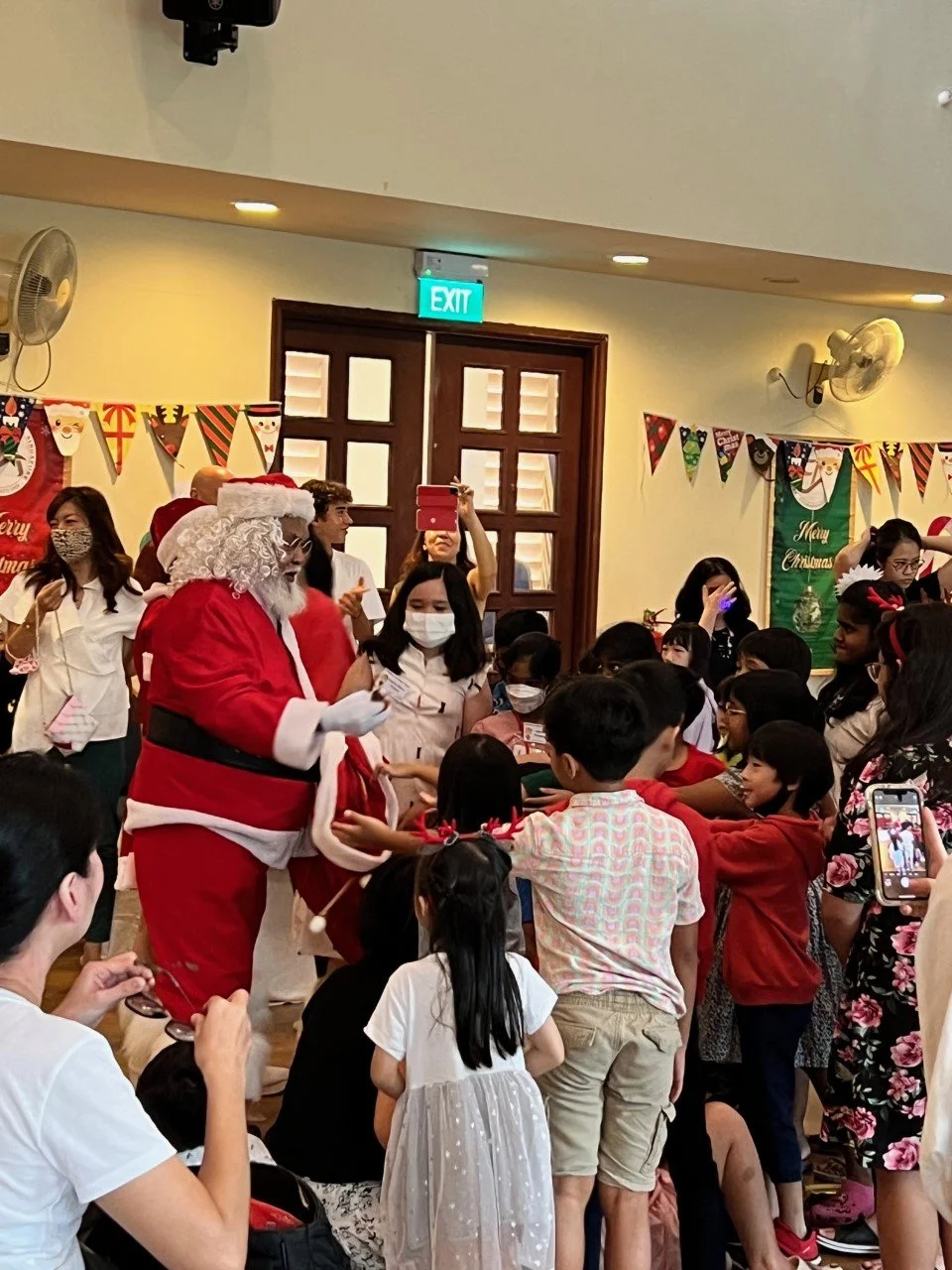 Ho Ho Ho! Santa making an appearance to give out goodies at the Children's Christmas Treat.