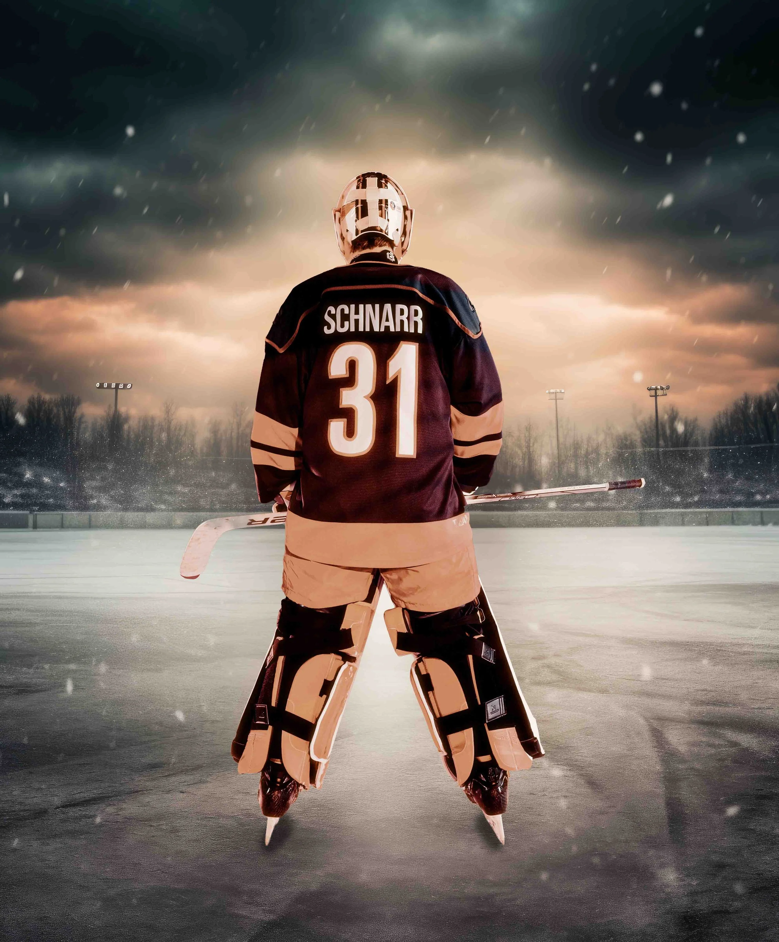 Hockey goalie standing on ice rink with cloudy sky and stadium lights in the background.