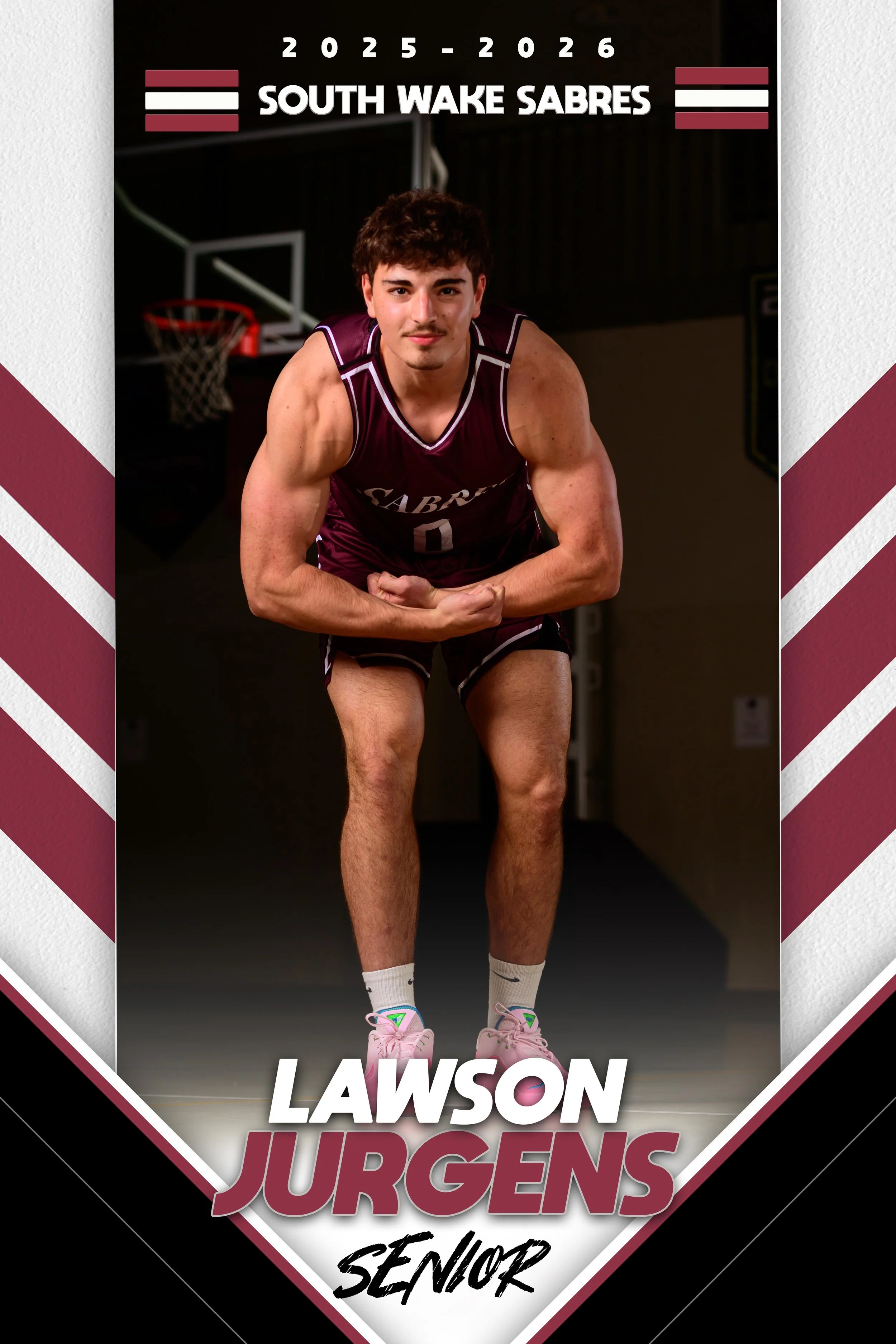 A basketball player in a maroon uniform with the number 0 kneeling on a basketball court, flexing his biceps, with a basketball hoop in the background. The poster says 'South Wake Sabres 2025-2026' at the top, and 'Lawson Jurgens Senior' at the botto
