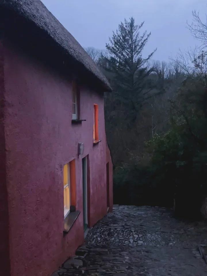 Part of the landscape.
Iron-rich reds rooting the building to its place.

The red cliffs at Peppercombe are 280 million years old, their exposed colour unique to this stretch of the Devon coastline. These iron-rich pigments were mixed with limewash t