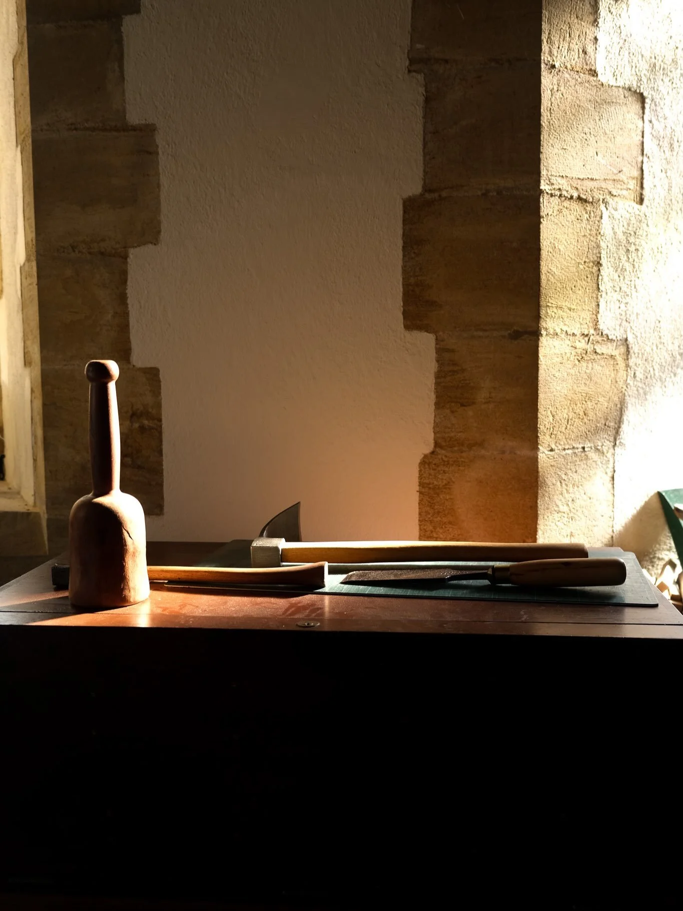 A peaceful corner of the workshop as the storms blow outside. 
Showing the tools Russ is using for his current work carving new sculpture for Cambridge.