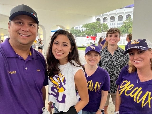 Ashlyn with her parents, Mark (l) and Alison (far right), Raxis COO Bonnie Smyre (middle), and friend Acey (back)