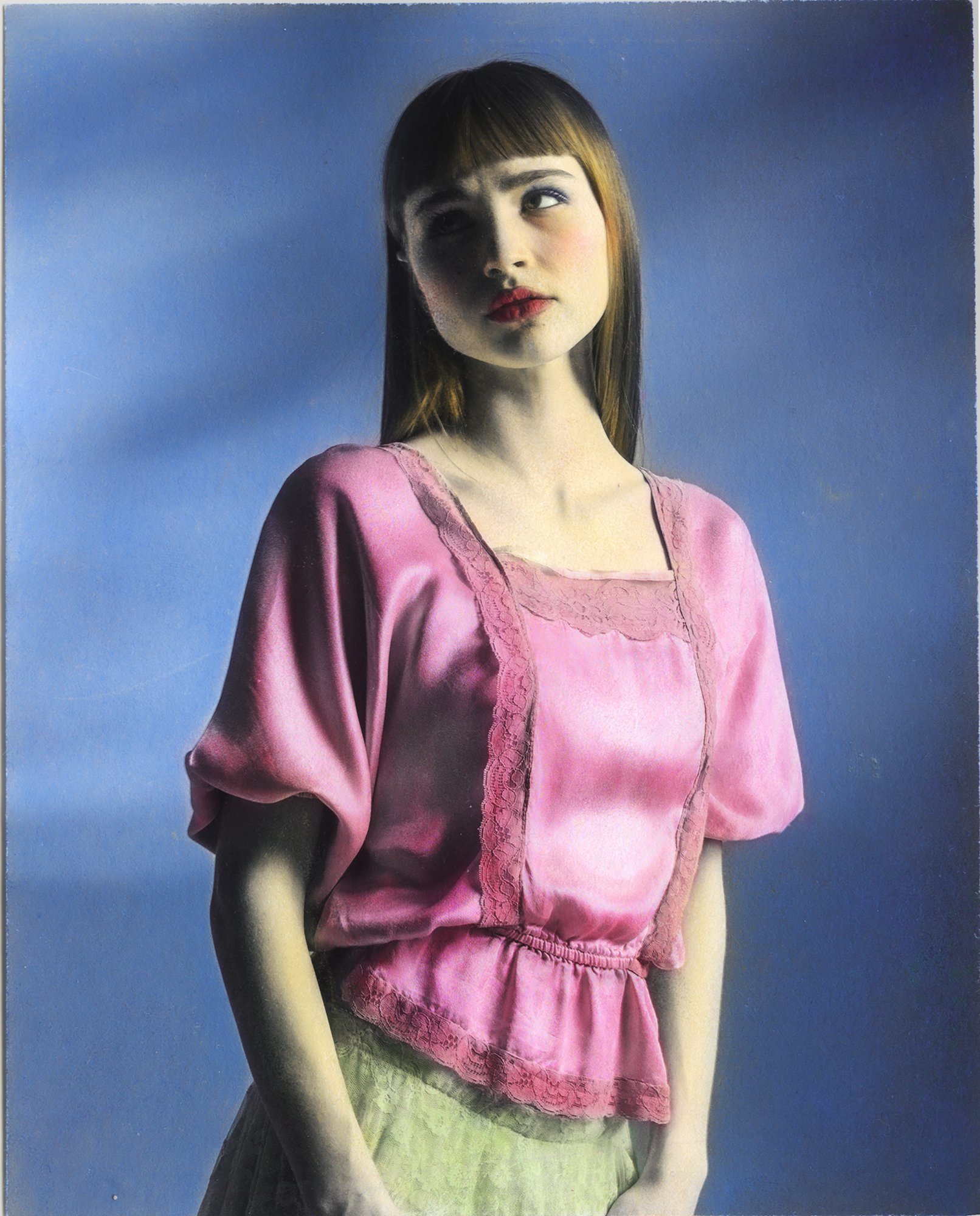 Woman, yellow hair, wearing pink blouse, green skirt, blue textured background, hand coloured