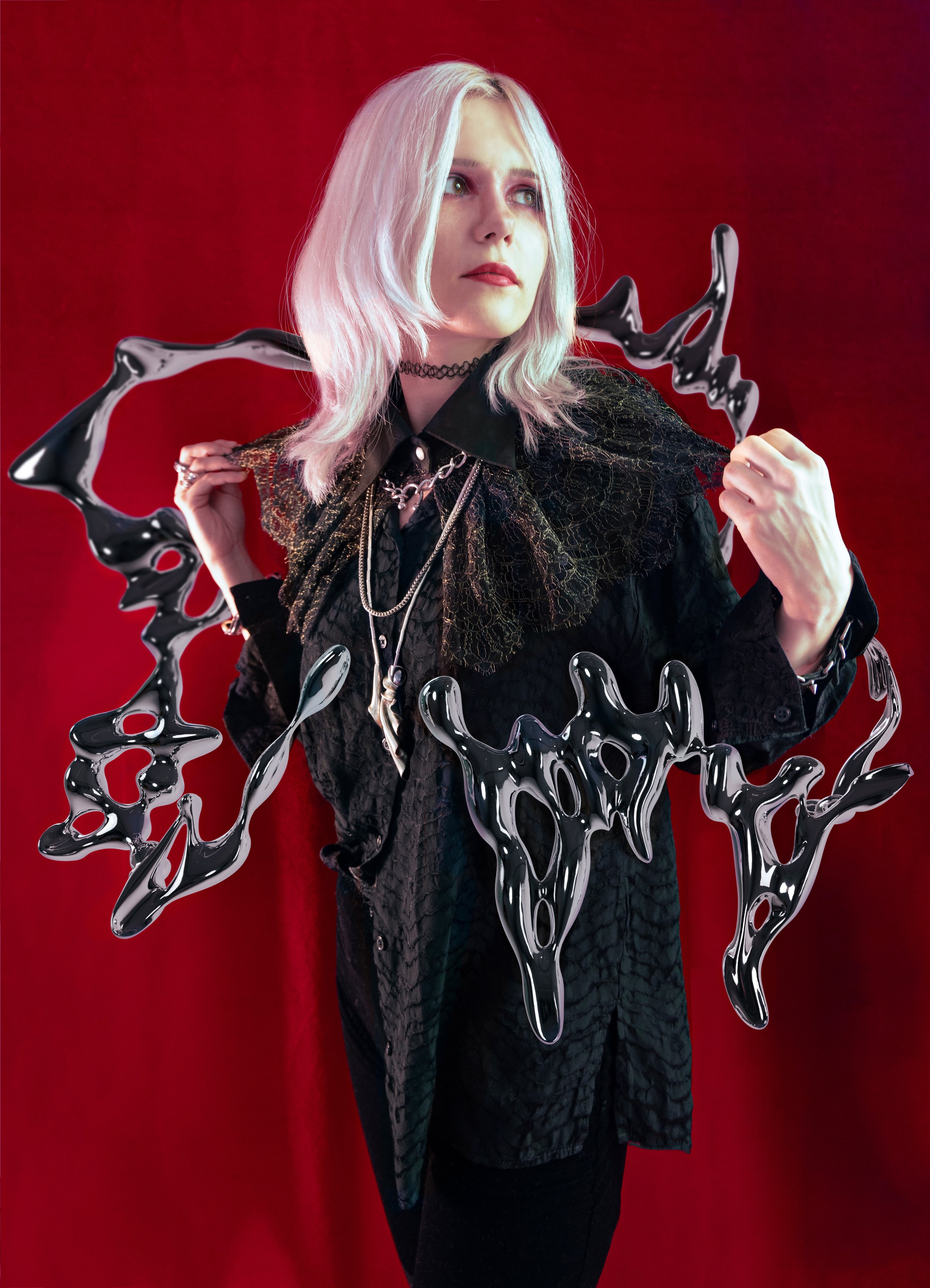 Woman flares out the collar of her shirt with a silver ring around her.