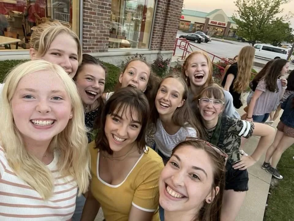Summer Intensive dancers smiling together during an outing