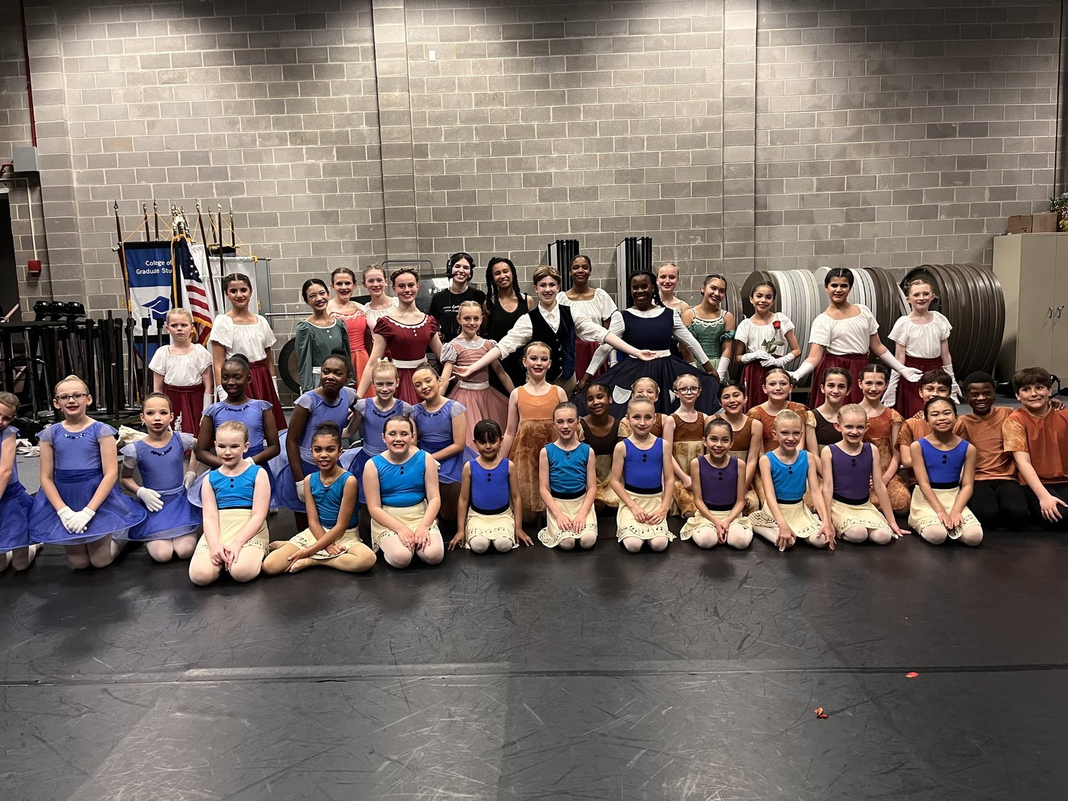 Ballet 5:8 artists and students gathered backstage before a performance