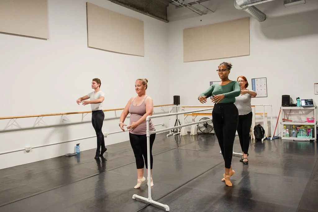 Adult ballet students taking class at Ballet 5:8