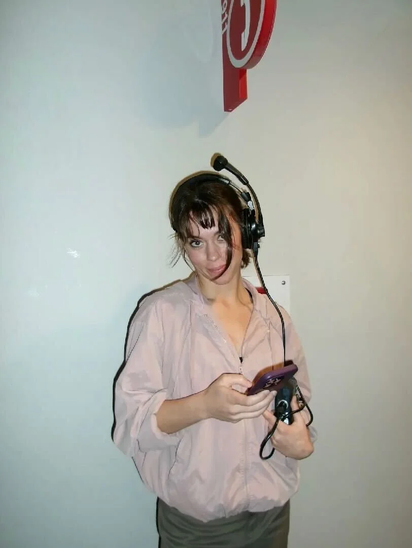 Backstage arts worker wearing a headset during a Ballet 5:8 production