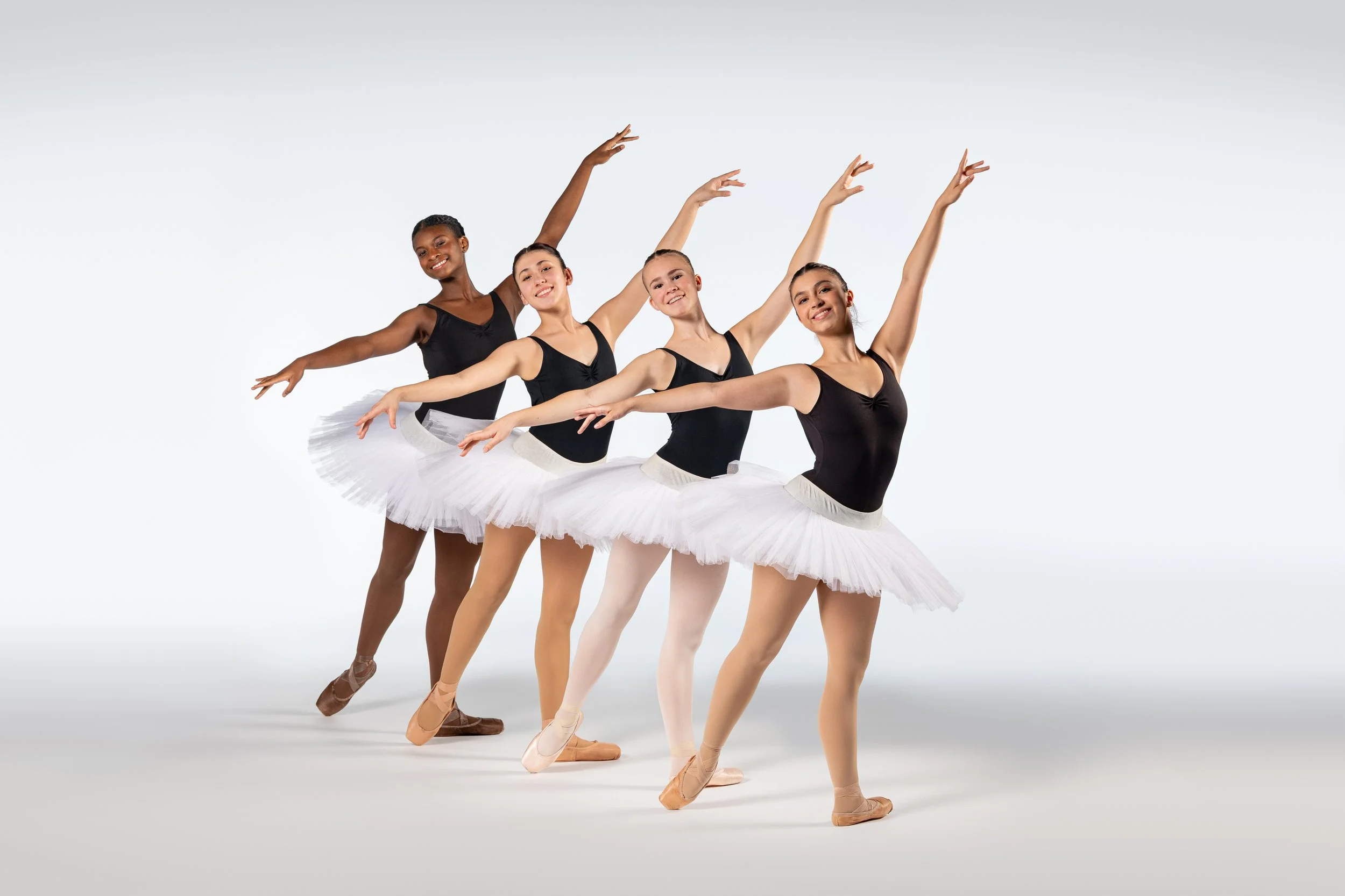 Four Ballet Five Eight dancers in white tutus