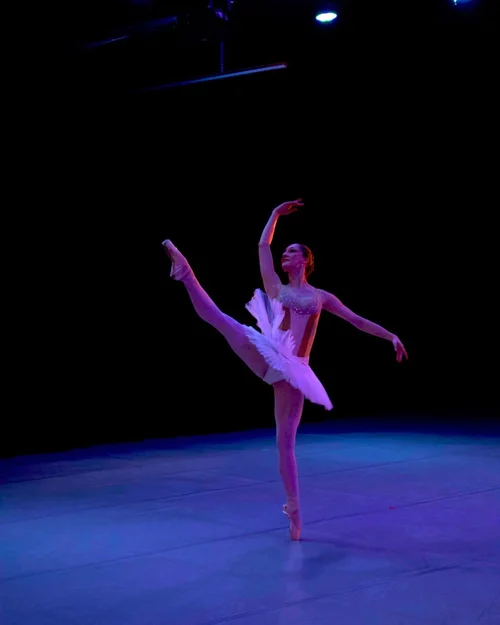 Dancer performing onstage at the American Youth Ballet Festival