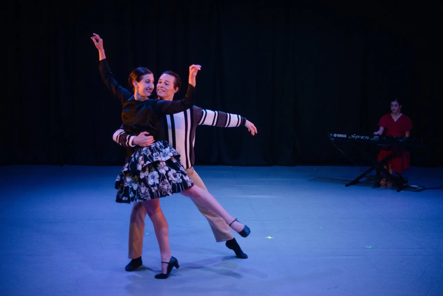 Ballet 5:8 dancers performing with live piano music