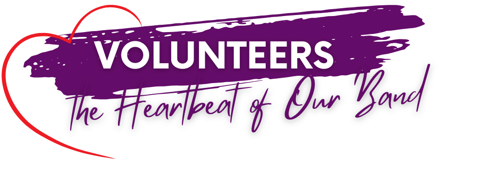 Logo with purple brushstroke background, white text 'VOLUNTEERS' and purple cursive text 'The Heartbeat of Our Land', with a red heart outline surrounding the left side.