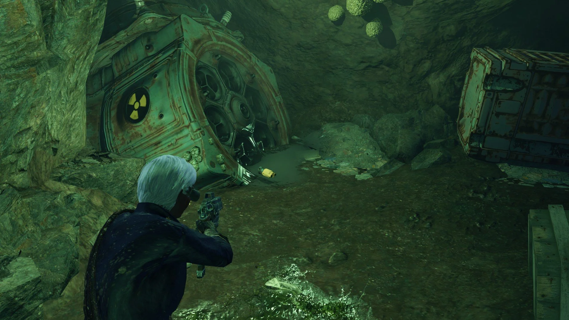 Fallout 4 - inside a dark cave with nuclear waste and a fusion core on the ground