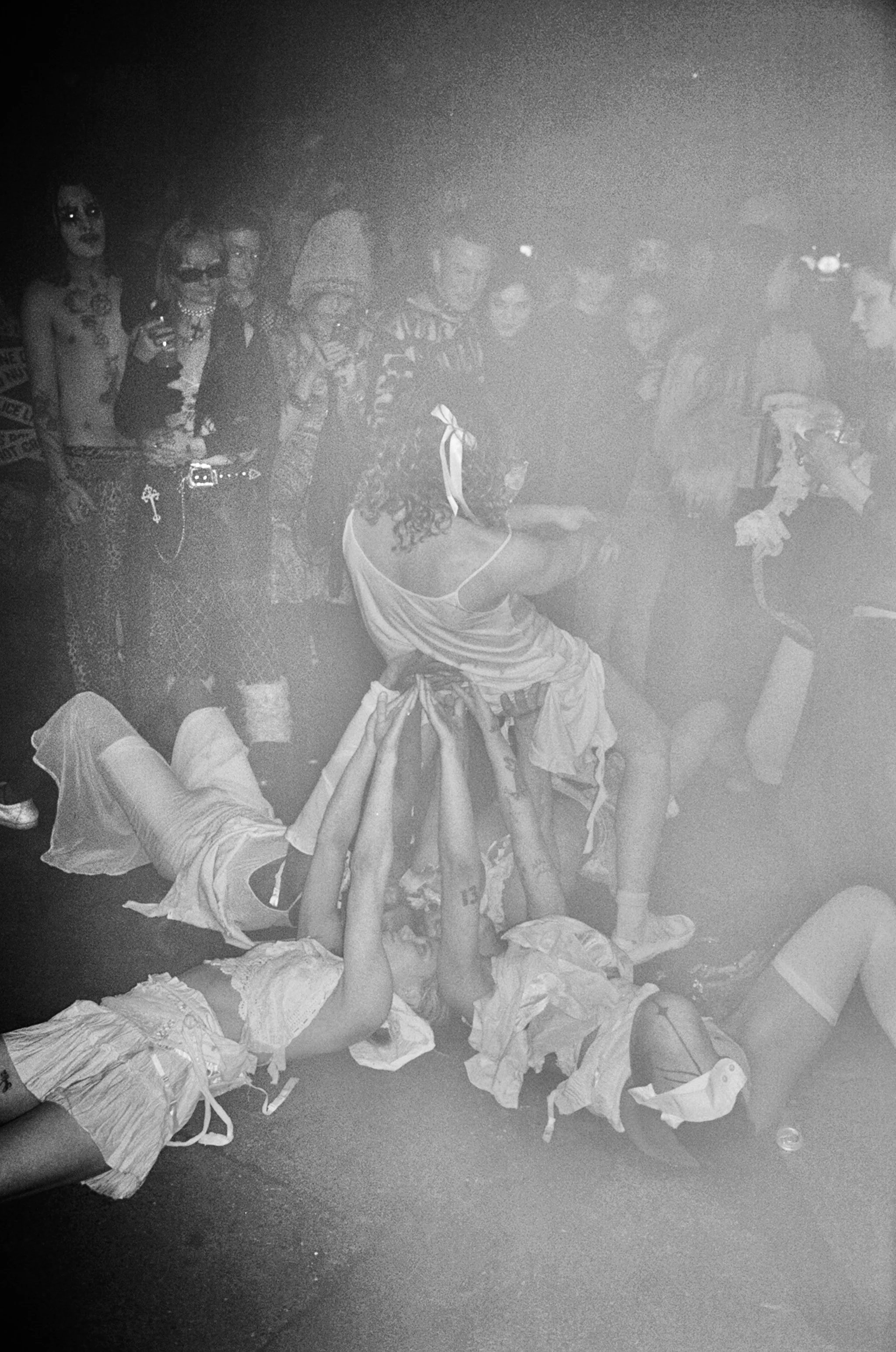 Crowd dancing at INFERNO queer nightlife event in London & Performance Art piece happening