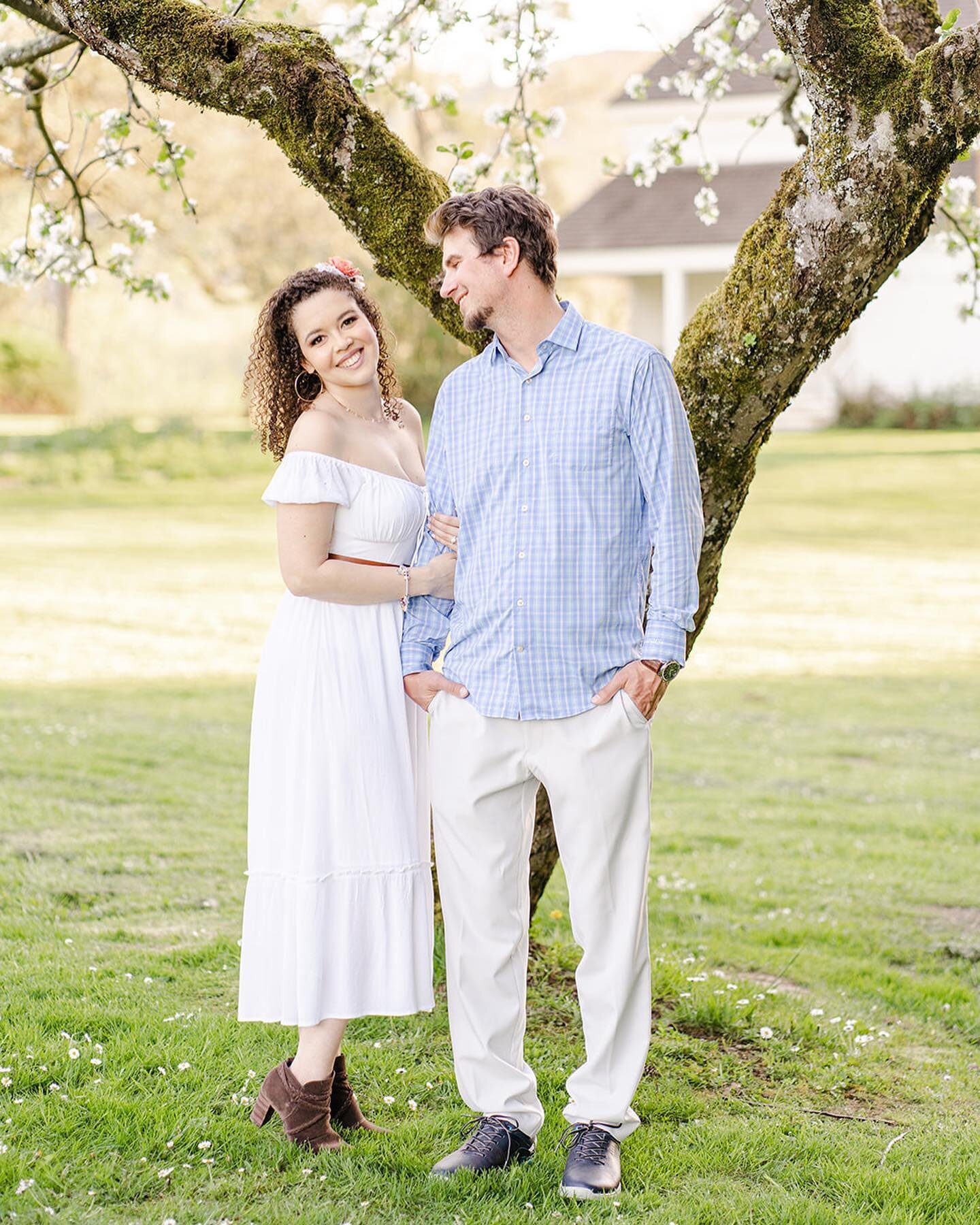 Not sure what to wear for your engagement session? Take a look at these outfits!  I love how Thais paired this white dress with brown boots and adorned her dark curls with a colorful floral hairpiece!  Gregg also crushed it with his checkered blue bu