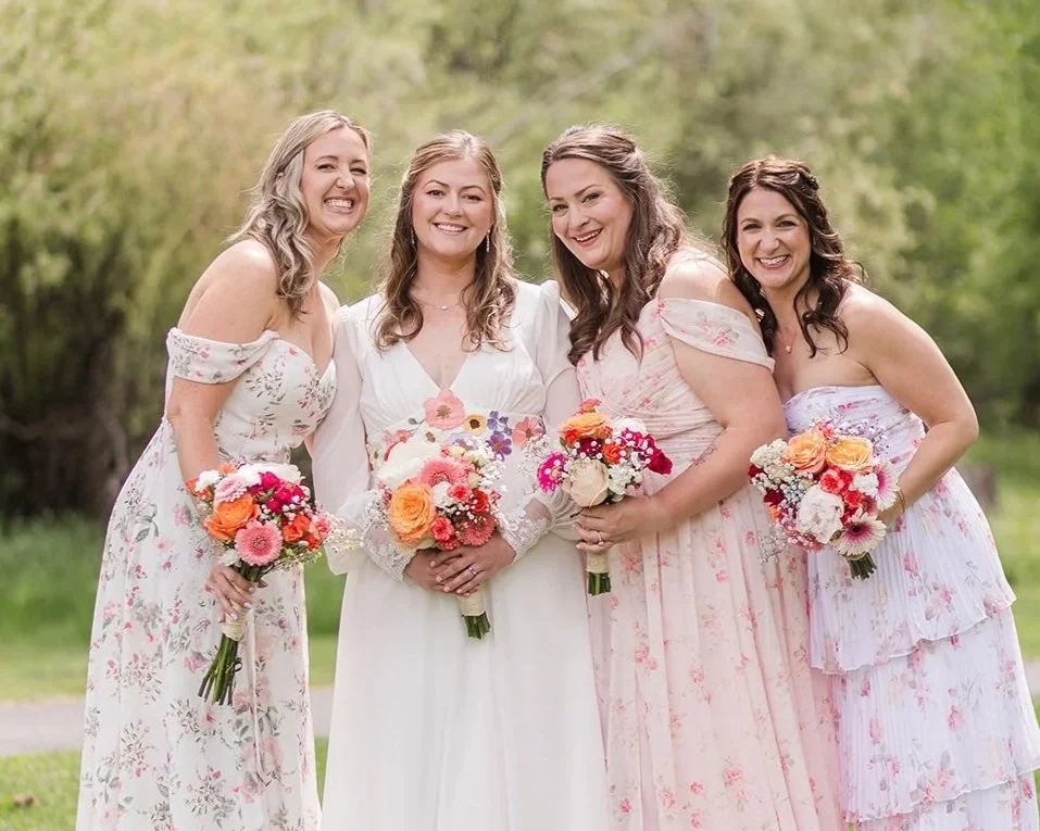 bride with her bridesmaids