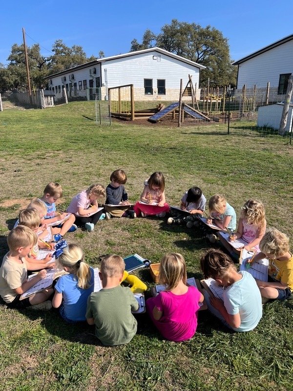  Circle time is one of the most important times of the day and when the weather outside is nice (which it usually is in Dripping Springs), our students take the classroom (and circle time) outside! 