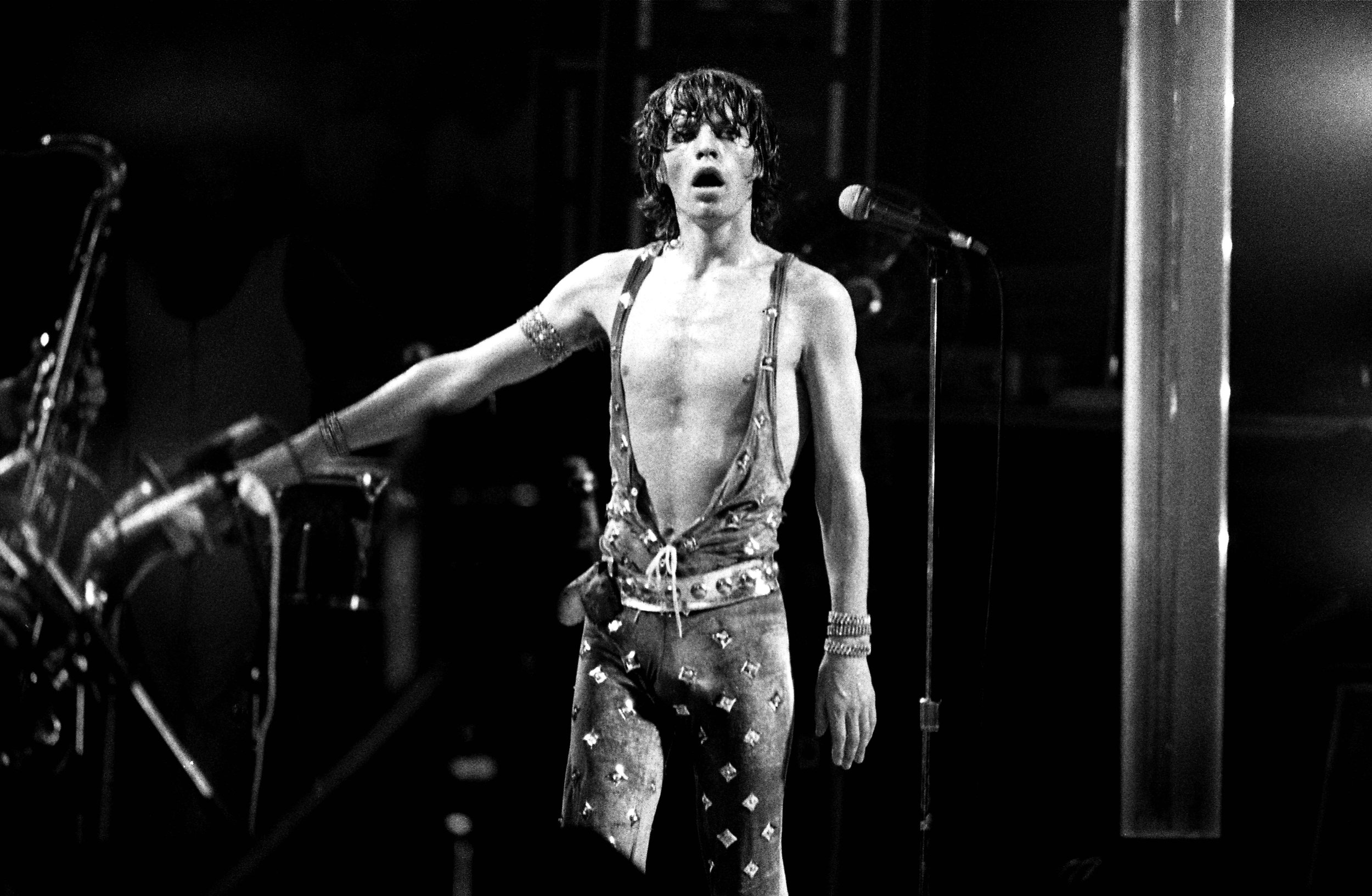 Mick Jagger onstage antics. Framed photograph