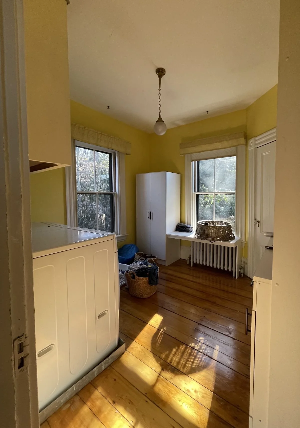 Existing guest bedroom of an 1846 Victorian home in Newton MA prior to primary suite reconfiguration showing original layout before conversion to primary suite