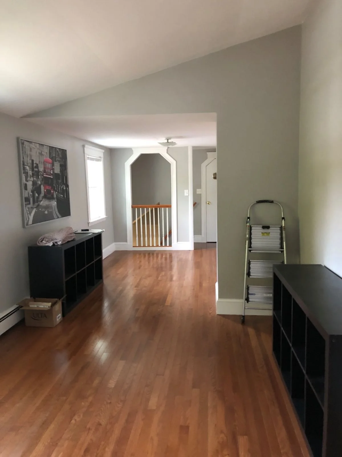 view through empty space to stair railing