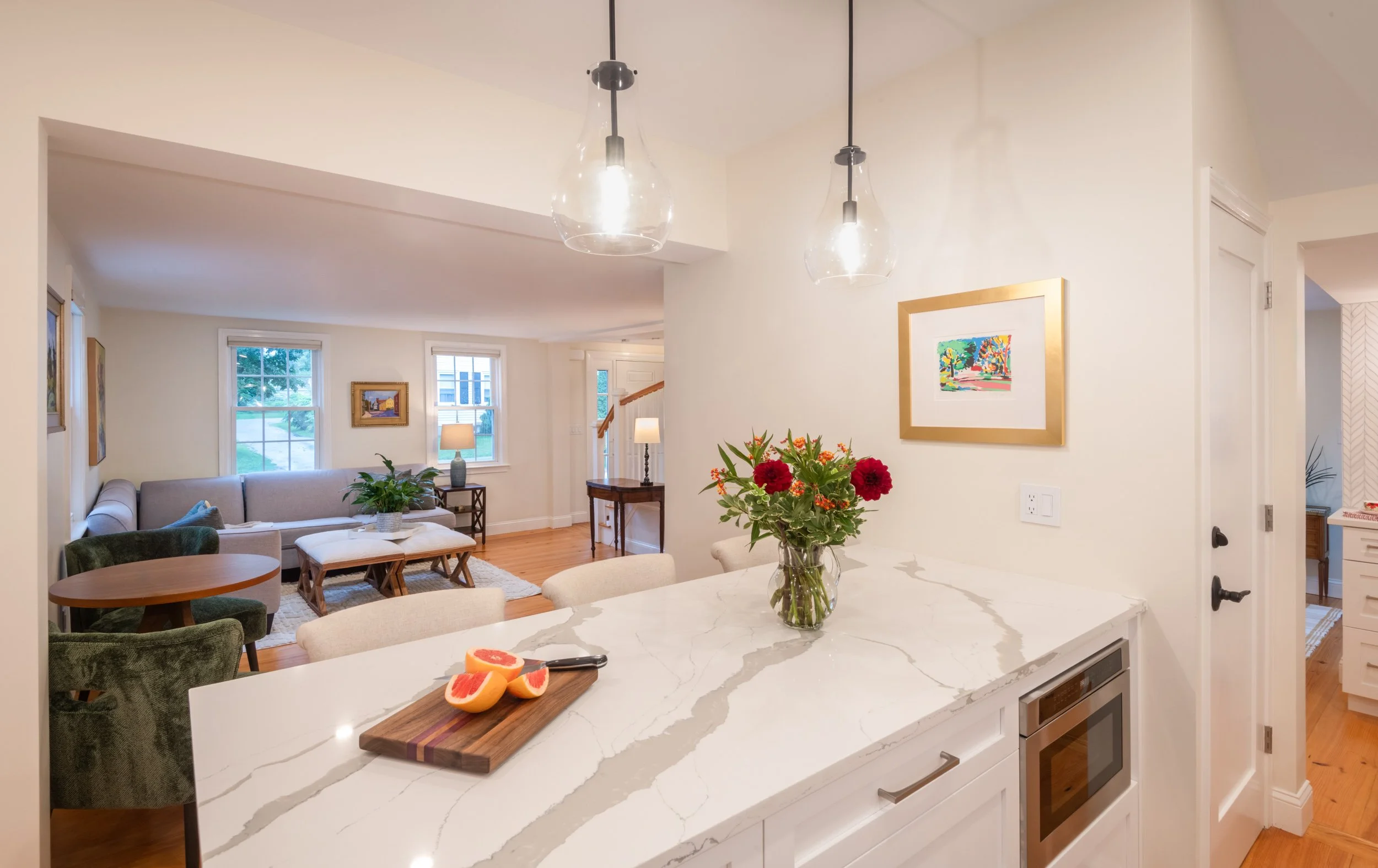 kitchen island view to living room and coffee nook
