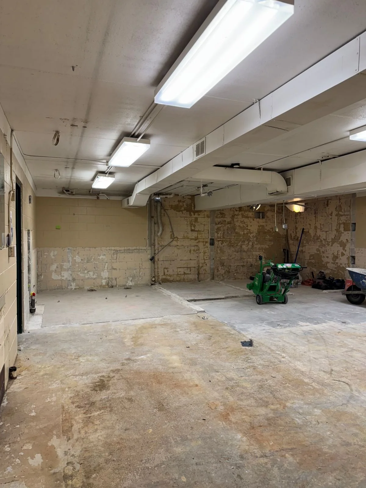 Demolition phase of construction in locker room at Woburn Racquet Club