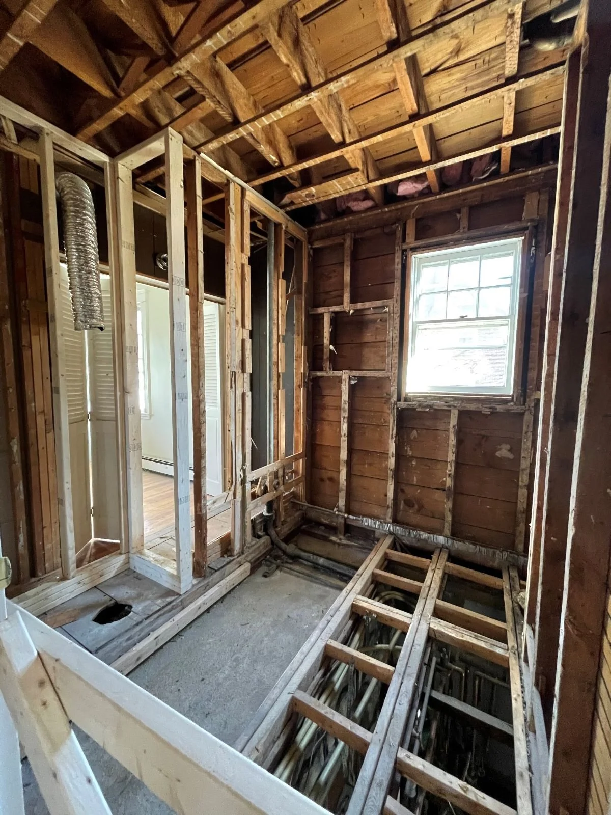 New framing for expanded shower following demolition