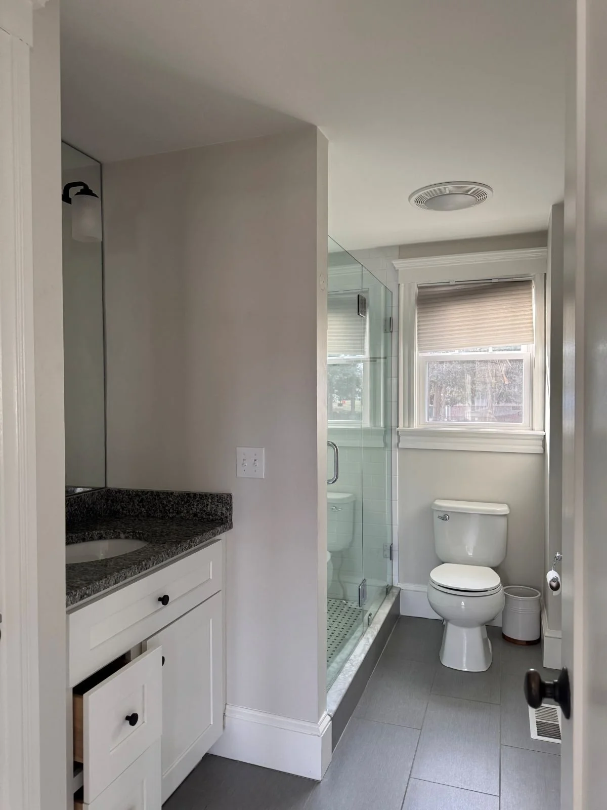 Existing primary bath on ground level before relocation and mudroom transformation