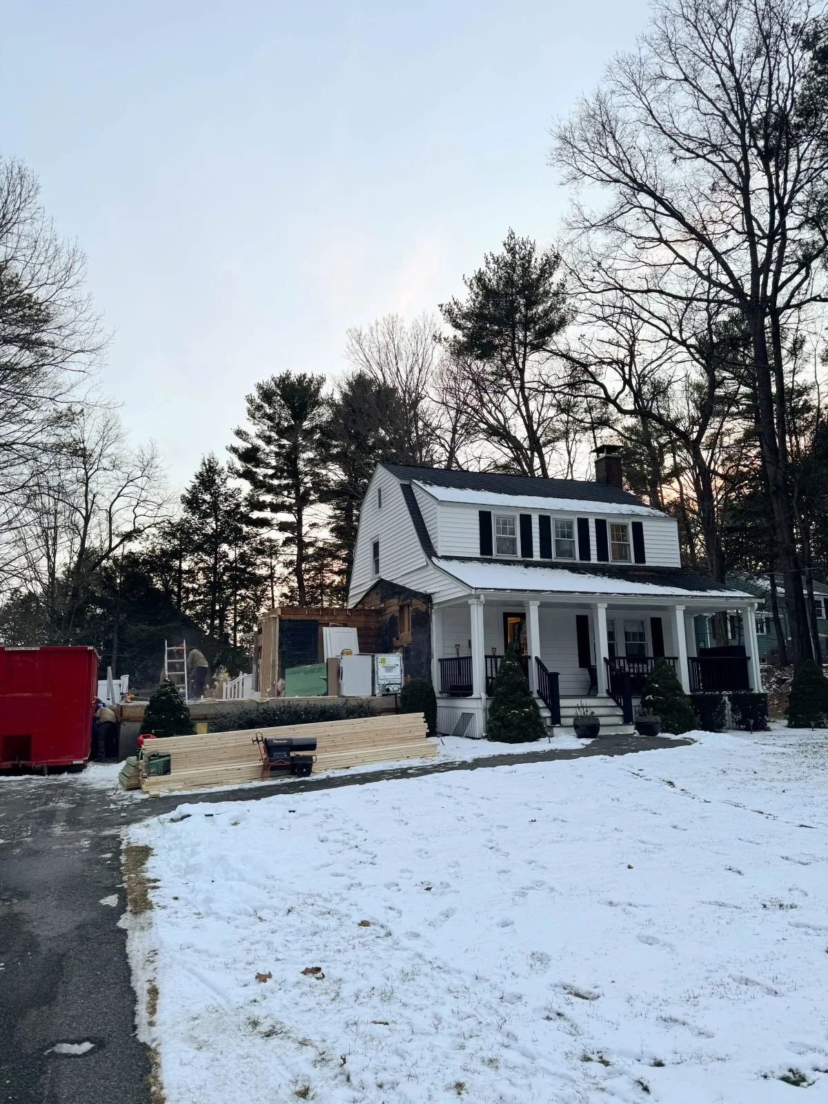 Construction view showing the portion of the Dutch colonial home that was demolished adjacent to the portion of the home that is being preserved.