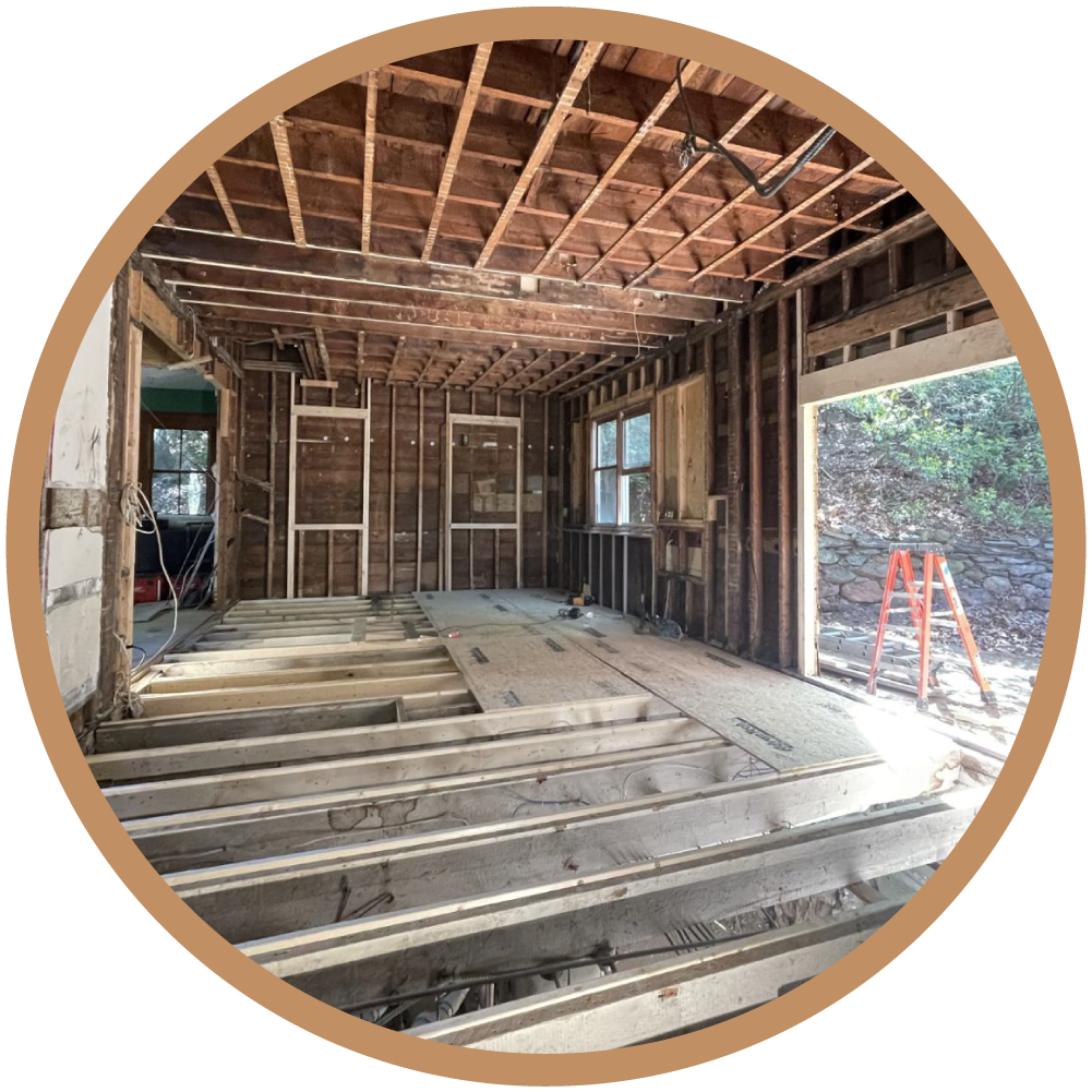 View of sistering existing floor joists to level out historic home's framing